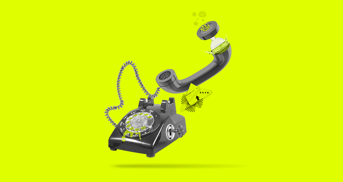 A rotary telephone with parts flying off, in front of a green background.