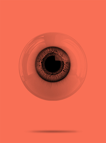 An eyeball in front of a red background.