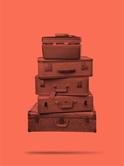 A stack of red-tinted suitcases.