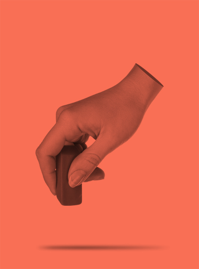 A red-tinted hand holding an eraser.